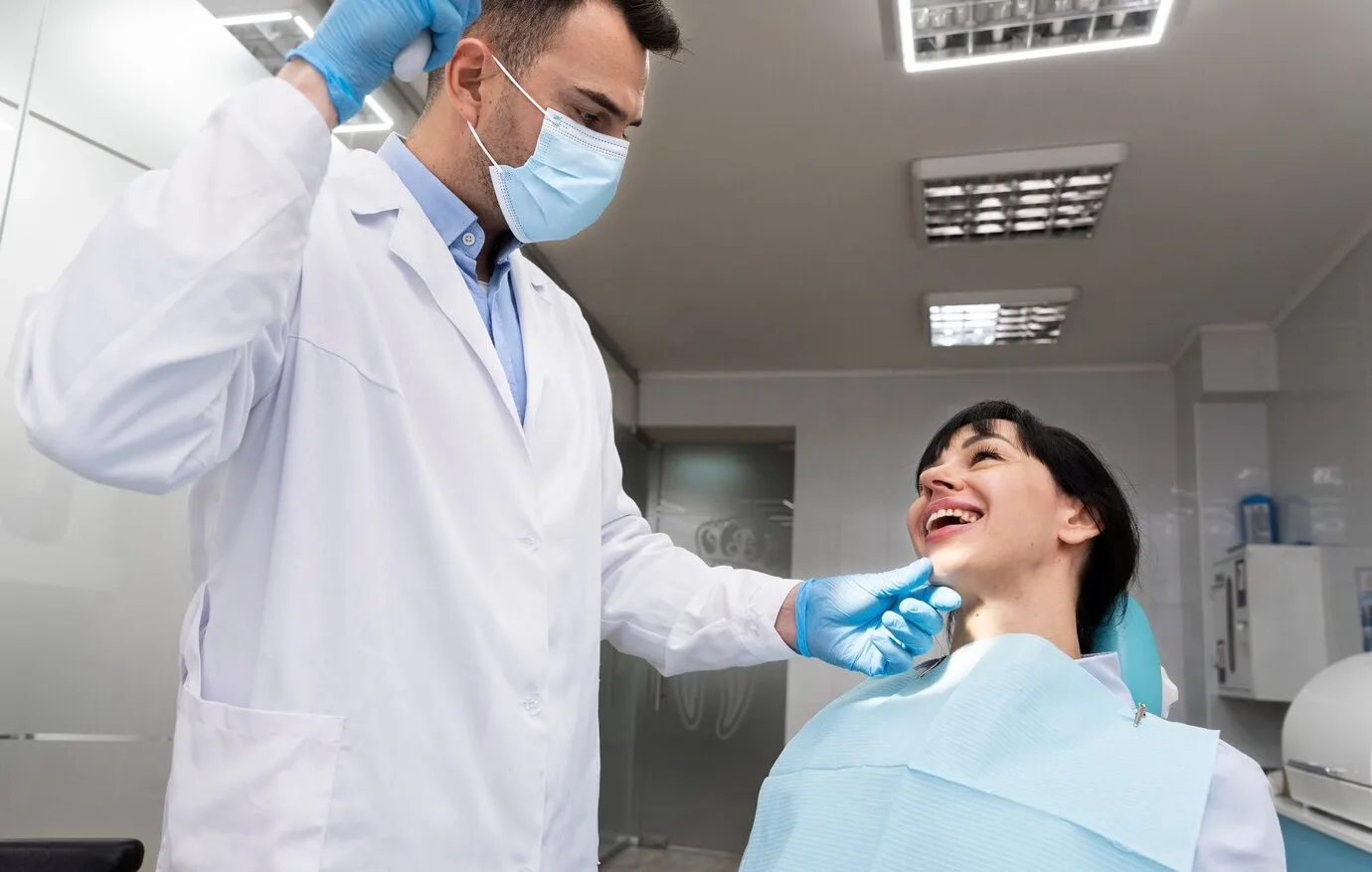 Dentist examining a patient at Dental Leaf Multi Speciality Dental Clinic